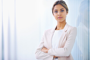 Business woman, arms crossed and confident in portrait, paralegal at law firm and serious with...