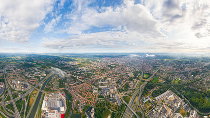 Ghent, Belgium. Industrial area. Panorama of the city. Summer day, cloudy weather. Aerial view