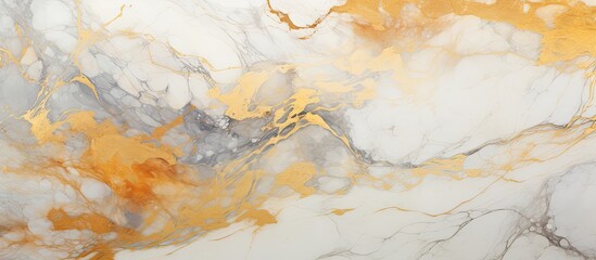 A detailed shot of a white and gold marble texture resembling a landscape painting with natural...