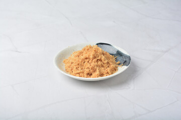 homemade chicken pork fish floss asian dry slices meat product in round plate on white marble table ingredient cafe restaurant food japan vegan halal snack festive menu