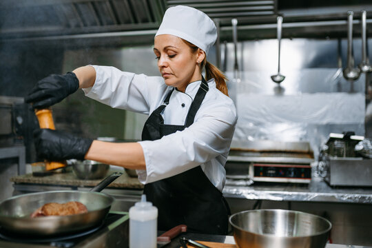 Cook in an industrial kitchen
