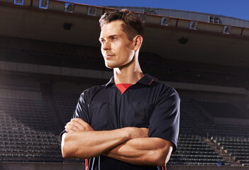 Man, arms crossed and referee for sport at stadium, personal trainer or coach with determination...