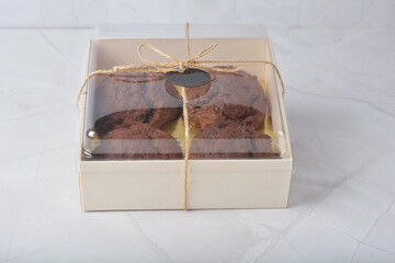 gourmet freshly bake golden Texas sweet chocolate chip honey biscuit cake scone milk butter bread in square bento wood box on white marble table rose gold fork knife pastry halal dessert vegan menu