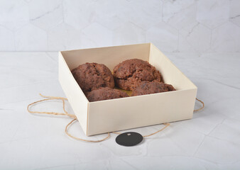 gourmet freshly bake golden Texas sweet chocolate chip honey biscuit cake scone milk butter bread in square bento wood box on white marble table rose gold fork knife pastry halal dessert vegan menu