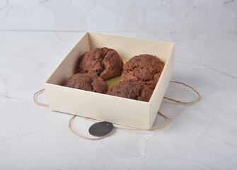 gourmet freshly bake golden Texas sweet chocolate chip honey biscuit cake scone milk butter bread in square bento wood box on white marble table rose gold fork knife pastry halal dessert vegan menu