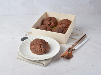 gourmet freshly bake golden Texas sweet chocolate chip honey biscuit cake scone milk butter bread in square bento wood box on white marble table rose gold fork knife pastry halal dessert vegan menu