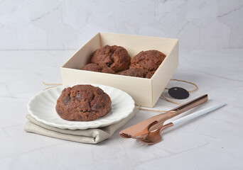 gourmet freshly bake golden Texas sweet chocolate chip honey biscuit cake scone milk butter bread in square bento wood box on white marble table rose gold fork knife pastry halal dessert vegan menu