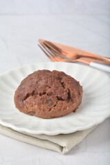 gourmet freshly bake golden Texas sweet chocolate chip honey biscuit cake scone milk butter bread in square bento wood box on white marble table rose gold fork knife pastry halal dessert vegan menu