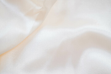 Abstract background of luxury fabric, folded textile or liquid wave or wavy folds silk texture...