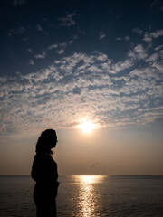 Silhouette Woman Standing and Facing Right