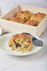 gourmet freshly bake golden Texas pope earl grey tea honey biscuit bun cake scone milk butter bread in square bento wood box on white marble table rose gold fork knife pastry halal dessert vegan menu