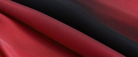 Sensual intertwining folds of black and red fabric