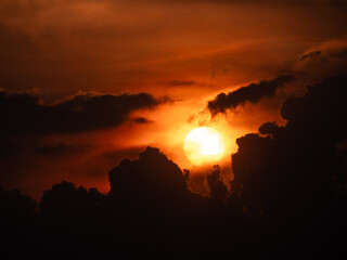 Yellow Sunset between Clouds at The Countryside of Twilight Time