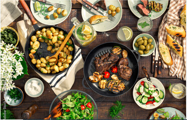 Different food on a wooden table. Baked meat and vegetables created with AI.