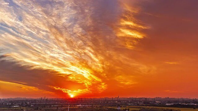 Time-lapse of beautiful natural landscape of fire clouds at sunset