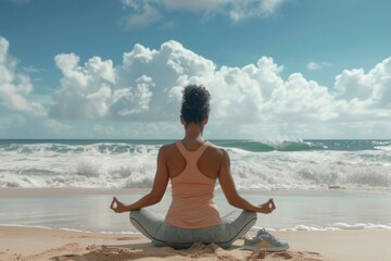 Fototapeta na wymiar A woman is sitting on the beach, practicing yoga. The sky is cloudy, and the ocean is in the background. The woman is in a relaxed and peaceful state, enjoying the calming atmosphere of the beach