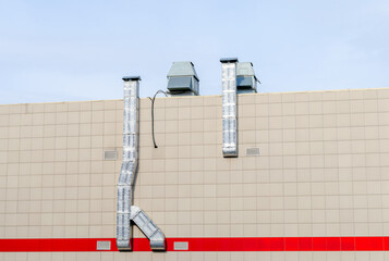 Ventilation ducts on the facade of the building