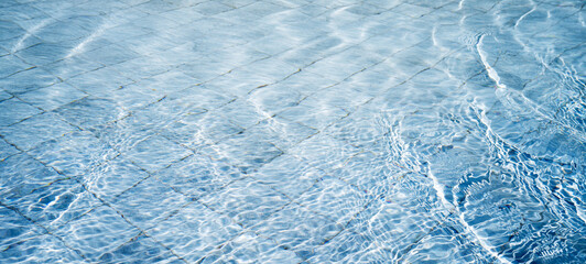 Swimming pool water surface, clear pool water abstract background 