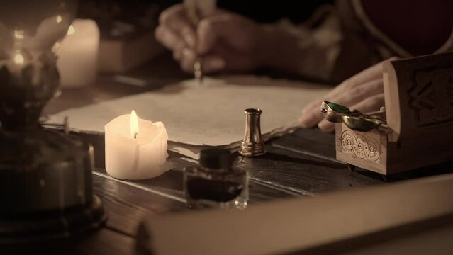 Antique female writing with old feather pen. Woman in renaissance dress writing a love letter with vintage quill pen on old parchment papers sheet.