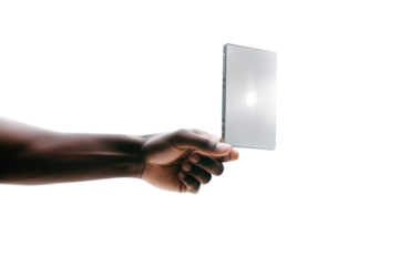 Person Holding Small Square Object. on a White or Clear Surface PNG Transparent Background.