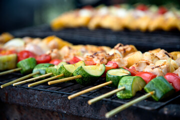 View of the skewers on the grill