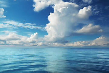 Obraz premium Blue sea and white clouds in the blue sky