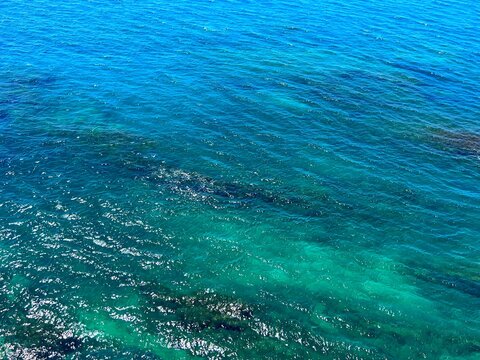 Sea surface blue turquoise glittering seascape