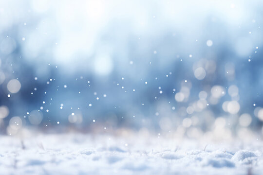 Cold snow falling background. white ice blur bokeh. Sparkling blue background. copy space.