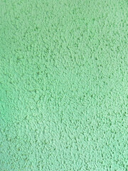 light green color plaster on the wall. plaster on the wall light green color