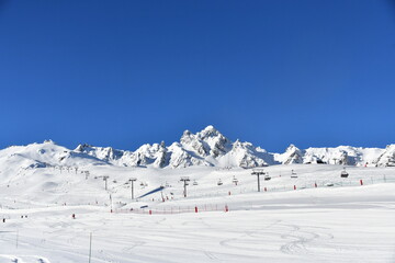 Fototapeta na wymiar Sk slopes of Courchevel ski resort by winter 