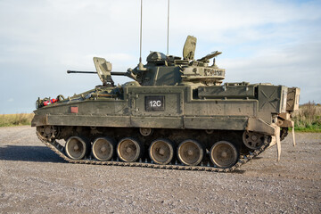 British army Warrior FV510 IFV in action on a military exercise, Wilts UK
