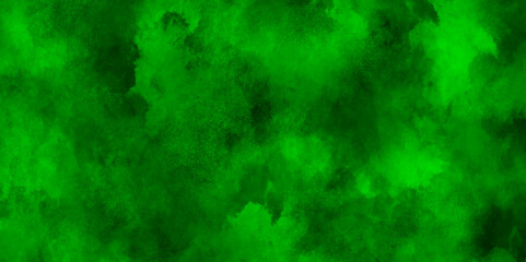 Obraz na płótnie Canvas Freeze motion of green dust explosion on black background.Green smoke stage studio. Abstract fog texture overlays,Explosive powder green on black background.