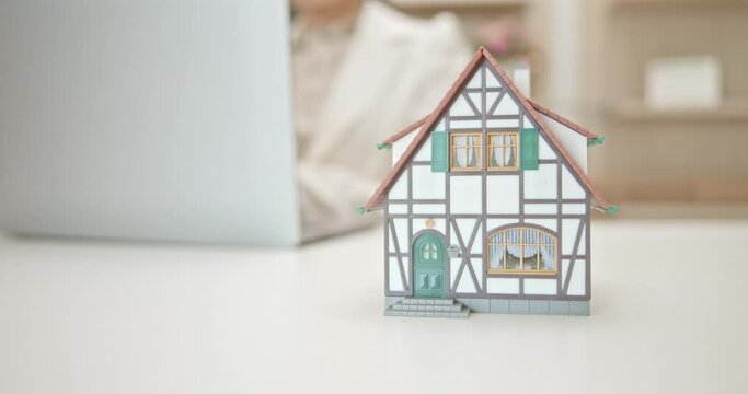 Mortgage loan or home equity loan, business concept : A borrower crafts a thorough mortgage loan proposal that showcases their financial stability, intentions, and ability to fulfill obligations.