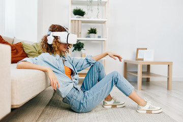 Smiling Woman Using Virtual Reality Glasses at Home: Indoor Technology Fun on the Sofa