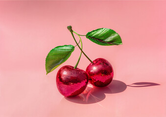 Τwo cherries that are disco balls on a pastel light red background, Disco party - 759613573