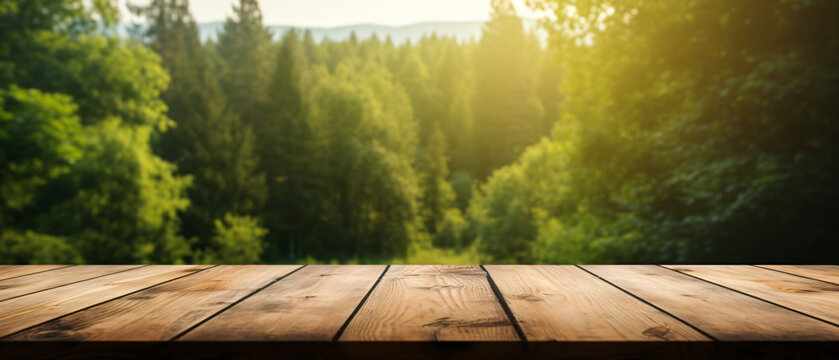 Image of wooden table in front green forest trees land