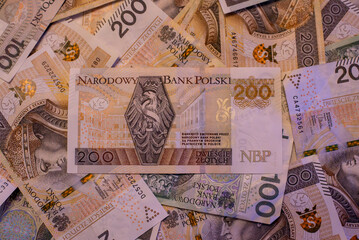 two bundles of money - 200 and 100 PLN - obrazy, fototapety, plakaty