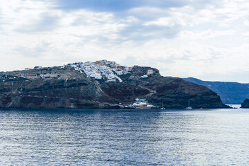 Fototapeta na wymiar View of Oia town on Santorini island in Greece. Travel mediterranean aegean of traditional cycladic Santorini white houses