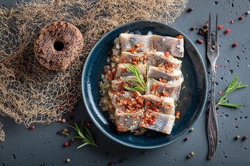 Spicy and sour marinated herring as mediterranean snack. - 759637749