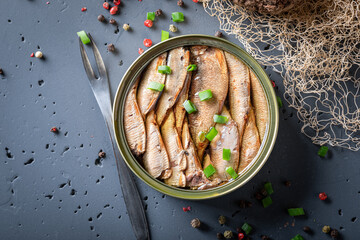 Tasty and healthy smoked sprats as a Polish appetizer. - 759638153