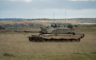 Fototapeta premium British army Challenger 2 II FV4034 main battle tank in action on a military exercise, taking aim