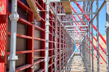 Vertical panel formwork, push-pull jacks and scaffoldings of reinforced concrete walls under...
