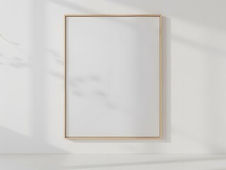 Minimalist Aesthetics: Blank Framed Poster on White Wall in a Sunlit Modern Interior
