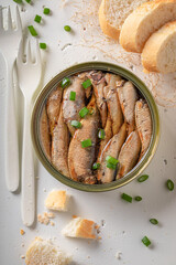 Salty and tasty smoked sprats as a Polish appetizer.