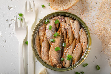 Tasty and healthy smoked sprats in small can. - 759639725