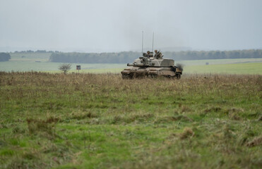 British army Challenger 2 II FV4034 main battle tank in action on a military exercise, taking aim