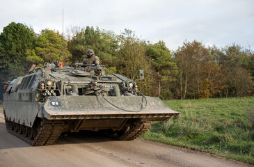 British Army Challenger Armored Repair and Recovery Vehicle (CRARRV) FV4204 in action on a military...