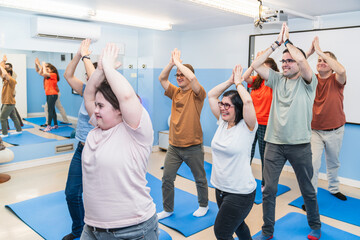A lively and inclusive yoga stretch session featuring students with Down Syndrome.
