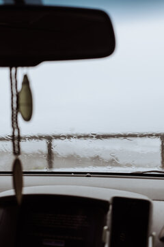 Sitting in the car on a wet day