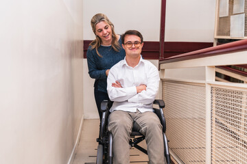 A man with Down Syndrome enjoys a companion's push in his wheelchair.